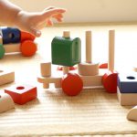 Toddlers building bricks